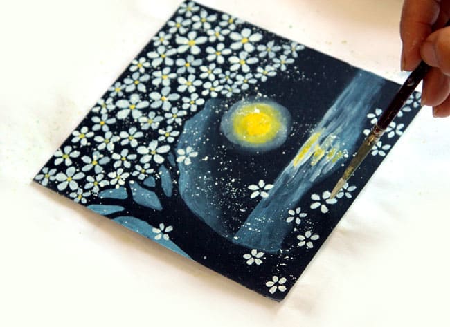 Easy and detailed tutorial on how to paint cherry blossoms on black paper, and create a magical night landscape of cherry blossoms in the moon light.