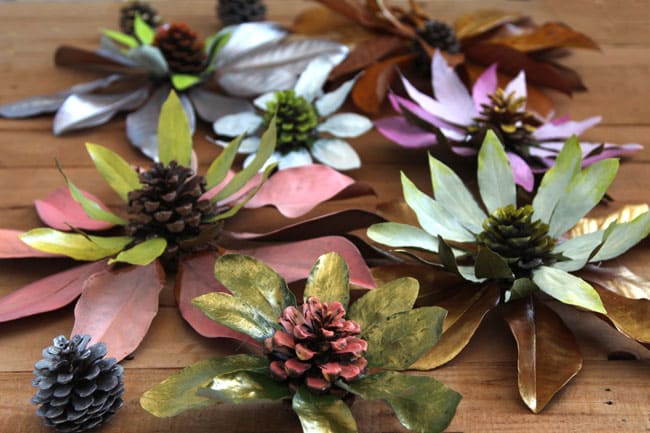 How to make flowers from nature walk findings such as pine cones and leaves. These giant blossoms make such dramatic, beautiful and free home decorations! via A Piece Of Rainbow