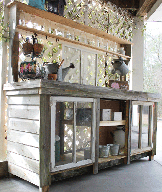 Free building plans to create a reclaimed window and reclaimed wood potting bench! So charming and rustic!
