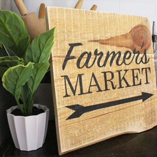 Make a gorgeous hand painted DIY Farmers Market Wood Sign from pallet wood. Perfect for farmhouse style decor! Free SVG Cut File included. - A Piece Of Rainbow