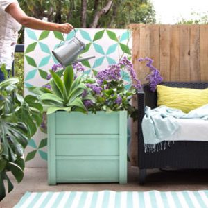 Beautiful DIY planter boxes easily for $10, using simple tools. Lightweight, portable, and long lasting, these large planter pots look amazing on a patio or deck. Free planter box plans included! - A Piece of Rainbow