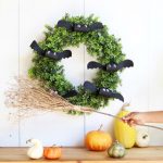 using DIY witches broom as indoor or outdoor Halloween decorations