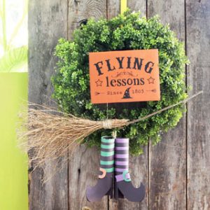 Make a magical flying witch DIY Halloween wreath easily for almost free! Great indoor or outdoor Halloween decorations, & super fun kids Halloween crafts! - A Piece of Rainbow