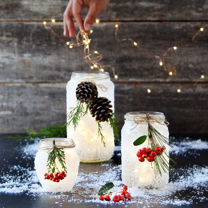 Christmas lights in DIY snow frosted mason jar decorations