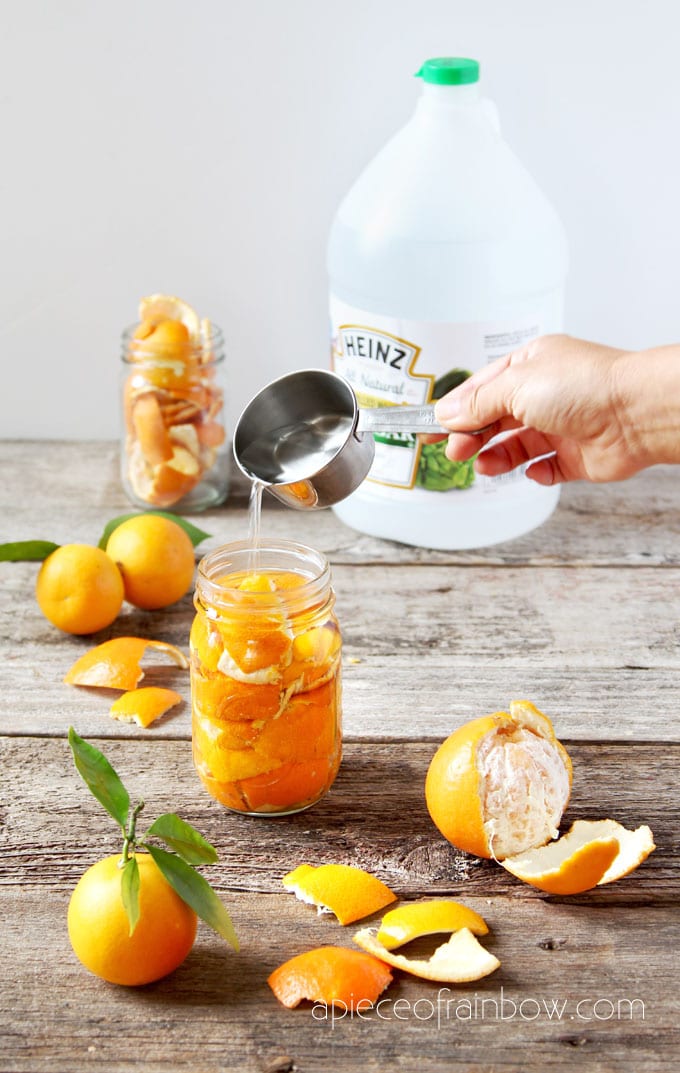 Fill a clean glass jar with citrus peels, pour distilled white vinegar into the jar until all the peels are submerged.