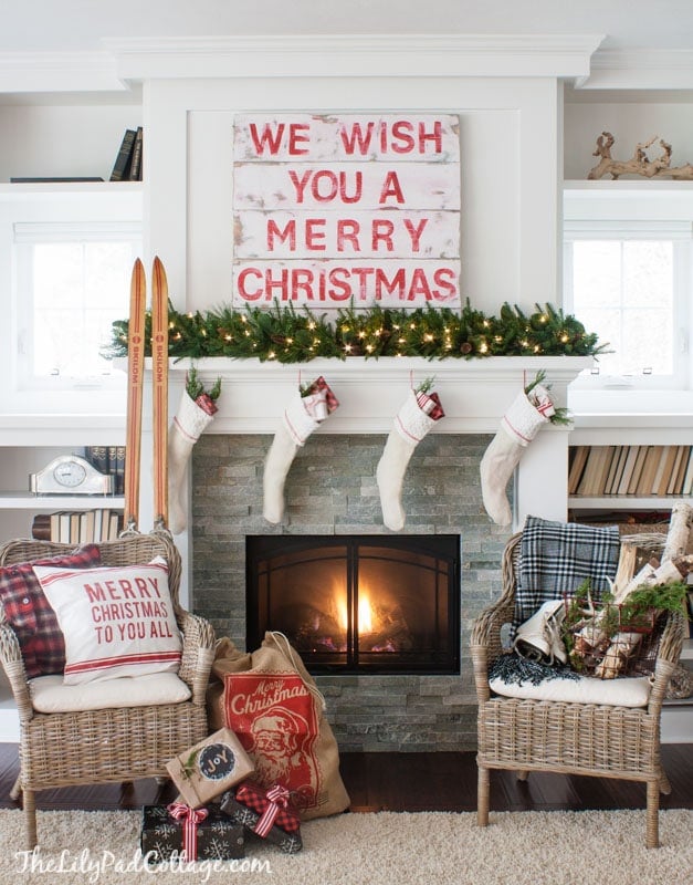 Christmas decorating with pillows and wood signs