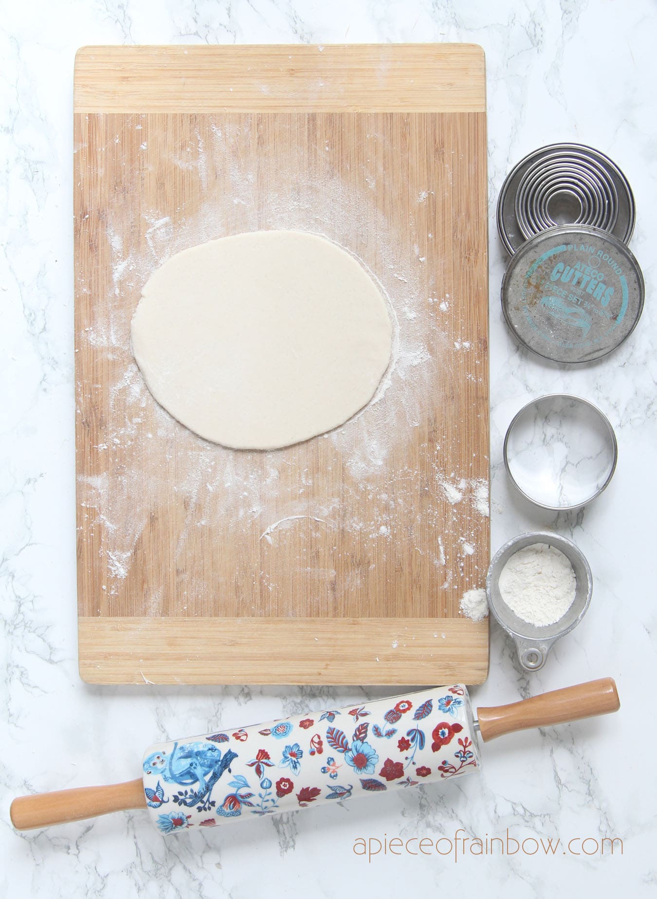 roll out salt dough on a board dusted with flour. 