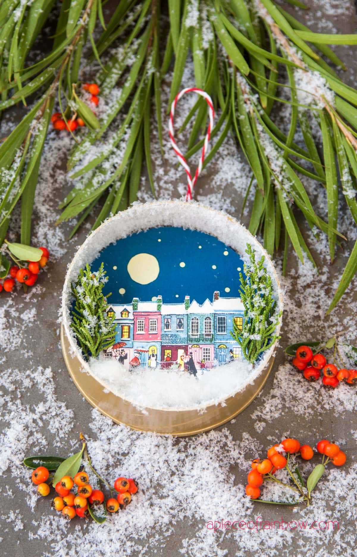 vintage, farmhouse, & Anthropologie style Christmas ornament with winter village snow scene and Christmas trees