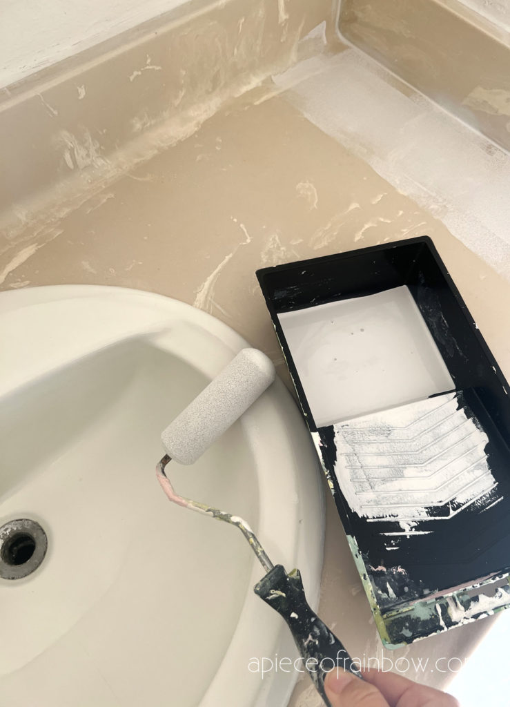 paint vanity top and bathroom sink with Marine topside enamel paint and foam roller  
