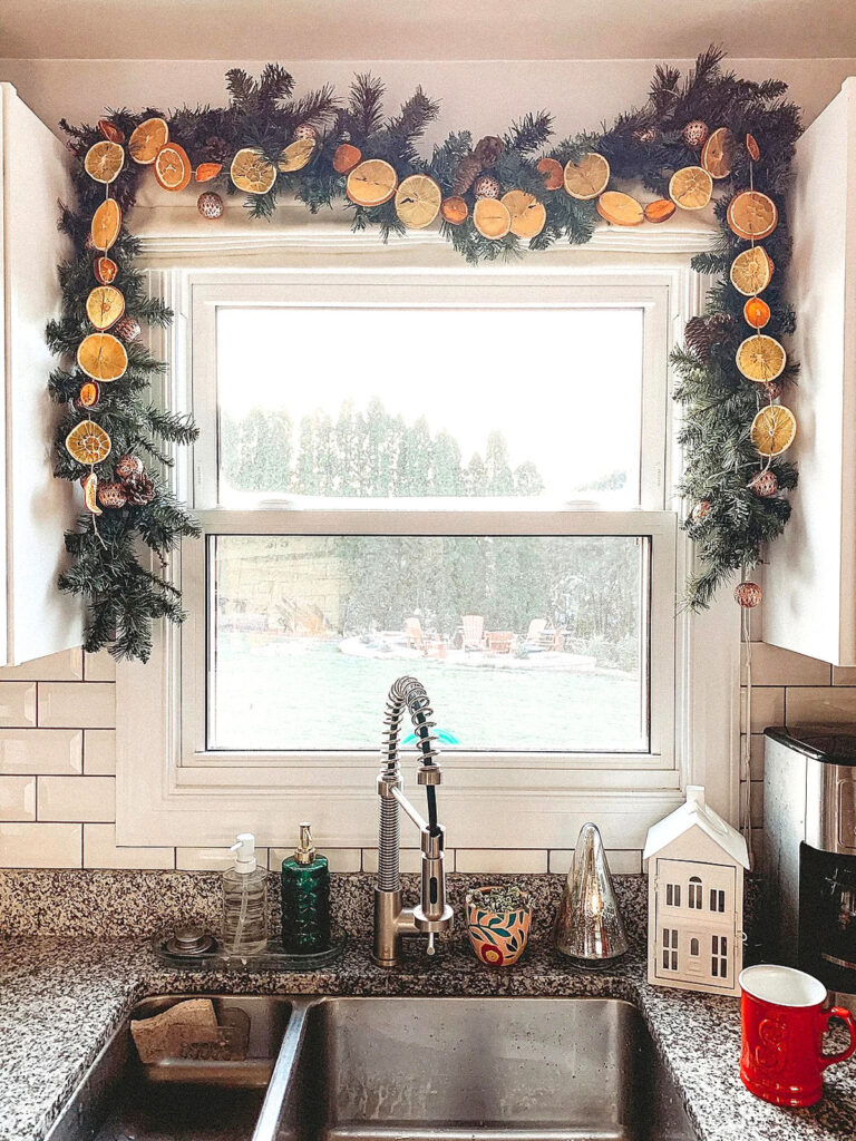 Christmas kitchen decorations with dried orange garland