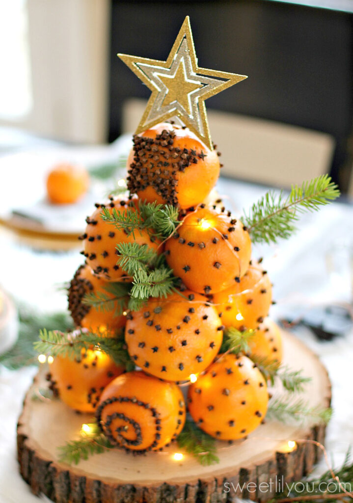 Orange topiary Christmas tree table decorations