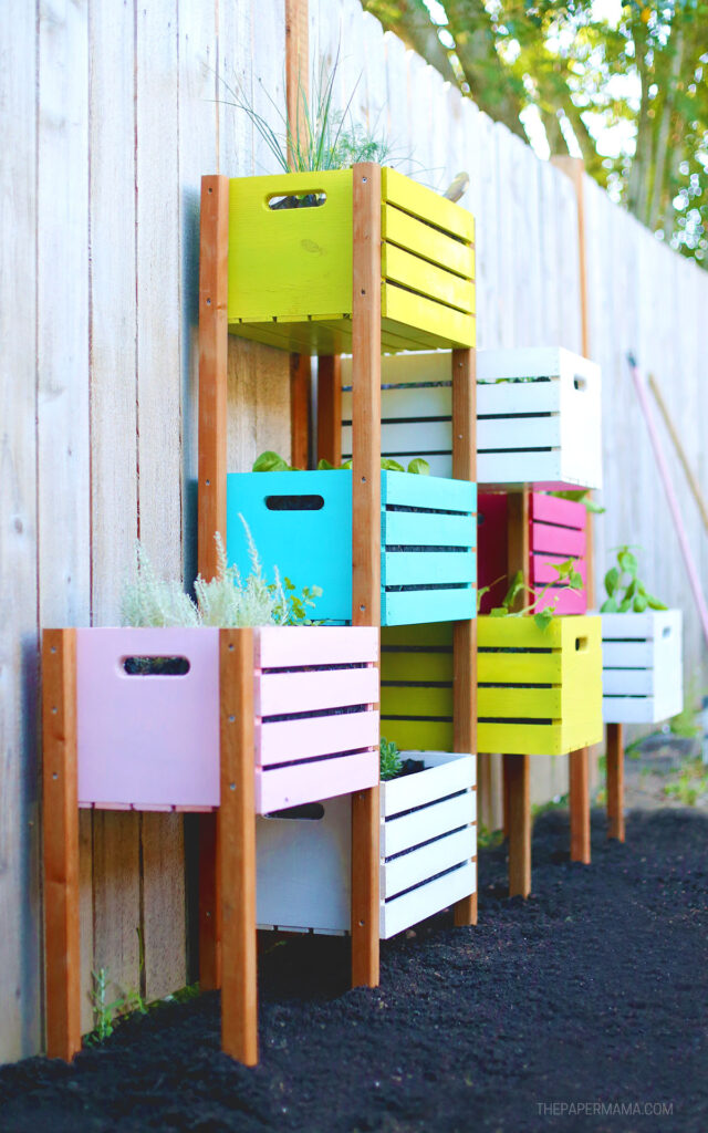 Colorful DIY vertical garden with crates