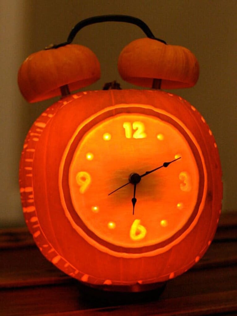 Carve a pumpkin clock
