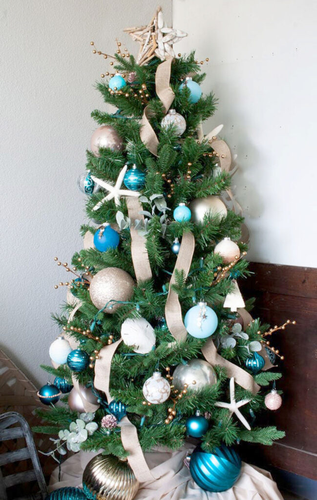 Coastal style Christmas tree with burlap ribbons
