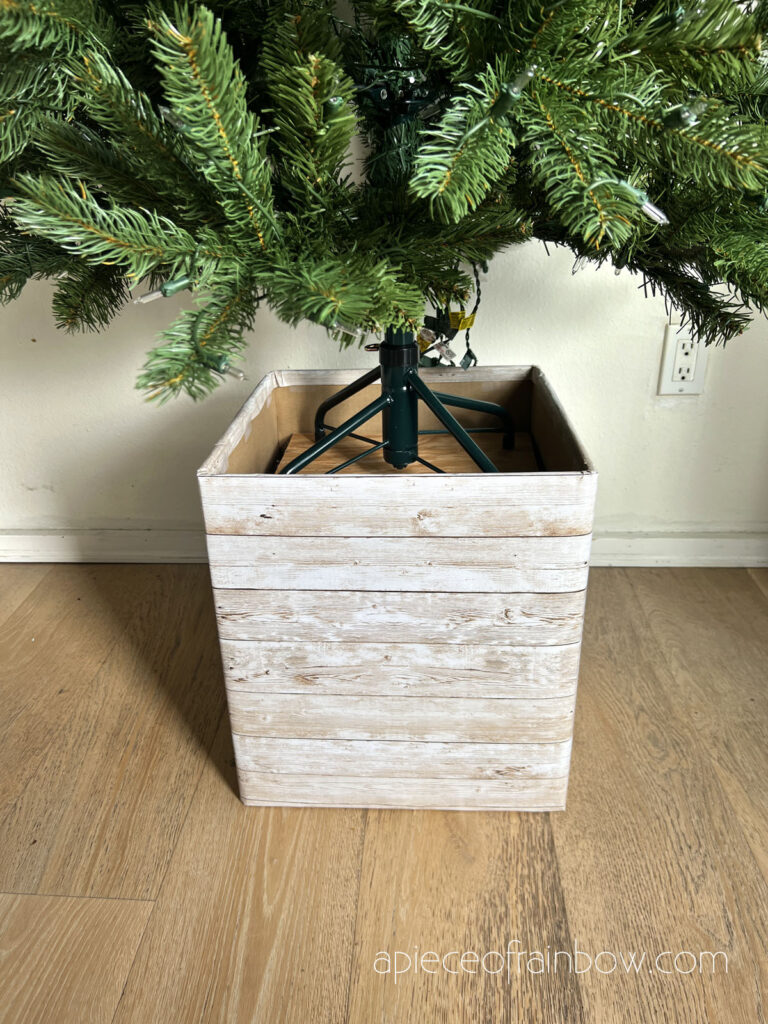 DIY elevated Christmas tree box stand faux wood planter made with cardboard