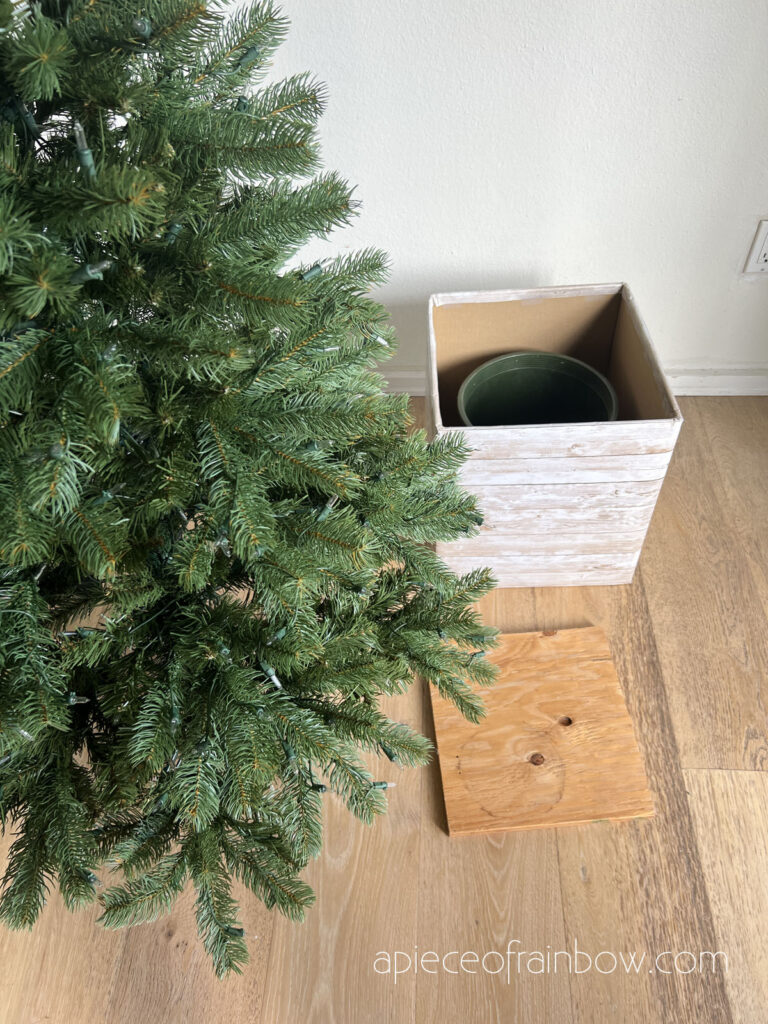 Elevate a Christmas tree stand.